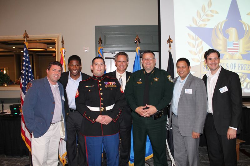 Mark Warzecha, Cpl. Robert Smith, Brevard County Sheriff Wayne Ivey, Mark Malek and Mason Williams