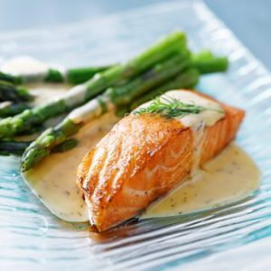 Salmon fillet with asparagus and yellow sauce