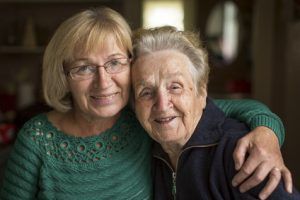 Portrait of an adult woman with his elderly mother.