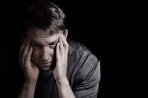 Mature man with headache from stress